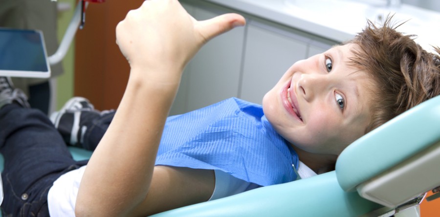 Boy in a dentist chair
