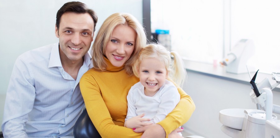 Family in a dentist office